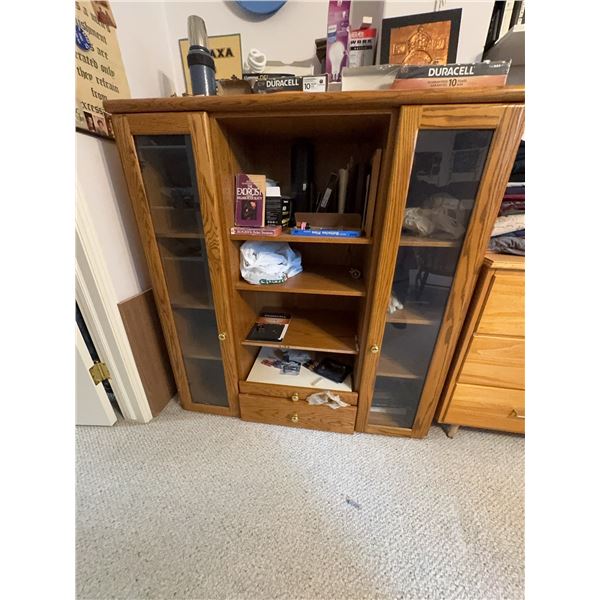 Oak Cabinet with Glass Doors and Contents Including Light Bulbs and Batteries