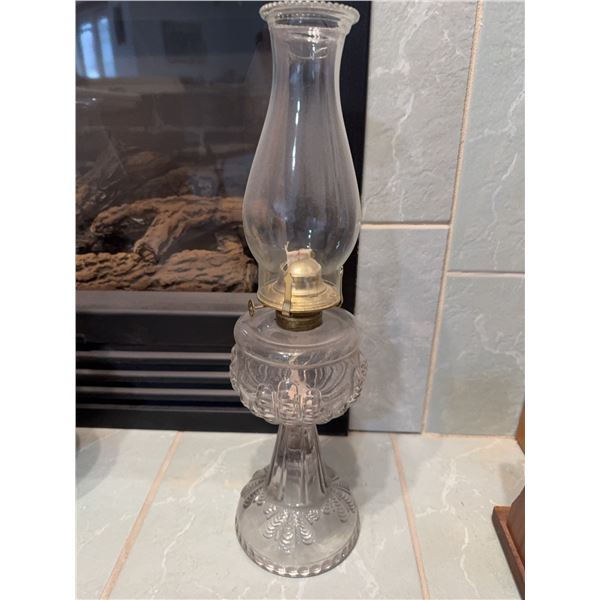 Clear Glass Oil Lamp with Brass Burner and Decorative Patterned Base