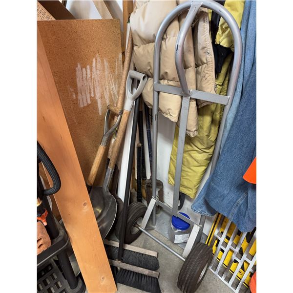 Metal Dolly and Assorted Hand Tools Including Shovel, Rake, Brooms, and Garden Tools