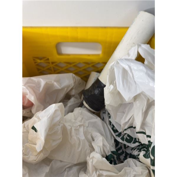 PVC Pipe Sections With Black Tape and Assorted Plastic Bags