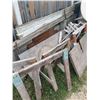 Image 1 : Salvaged Wood, Sawhorses, Round Tabletop, Birch Logs, and Metal Pieces