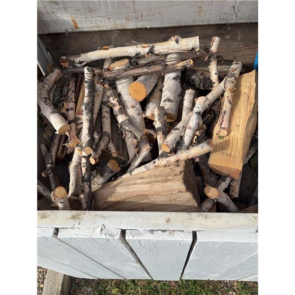 Firewood Including Birch Logs and Mixed Hardwood Pieces in White Bin