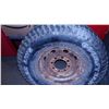 Image 1 : 2.85 X 75 X 16 USED TIRE ON AN 8 HOLE DODGE RIM
