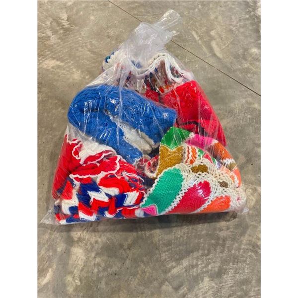 BAG OF ASSORTED KNITTED BLANKETS