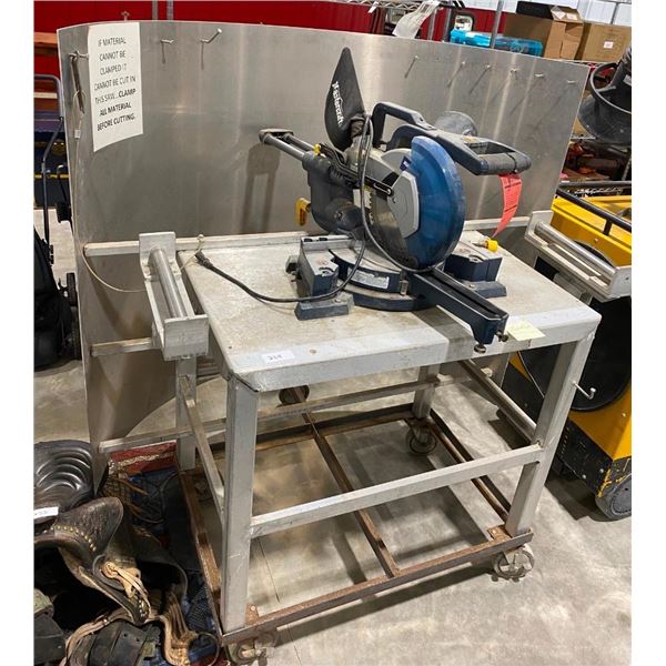 10IN MASTERCRAFT CHOP AND ANGLE SAW ON A 36IN ROLLING WORK TABLE WITH SPARK SHIELD