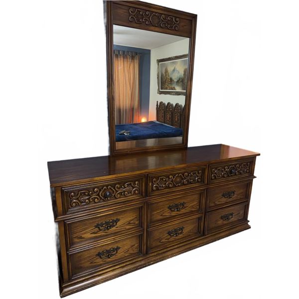 Wood Dresser With Ornate Carved Front, 9 Drawers, and Framed Mirror 33" x 48"