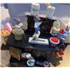 Image 2 : Textiles, Seashells, Metal Tools, and Decorative Miniature Stove