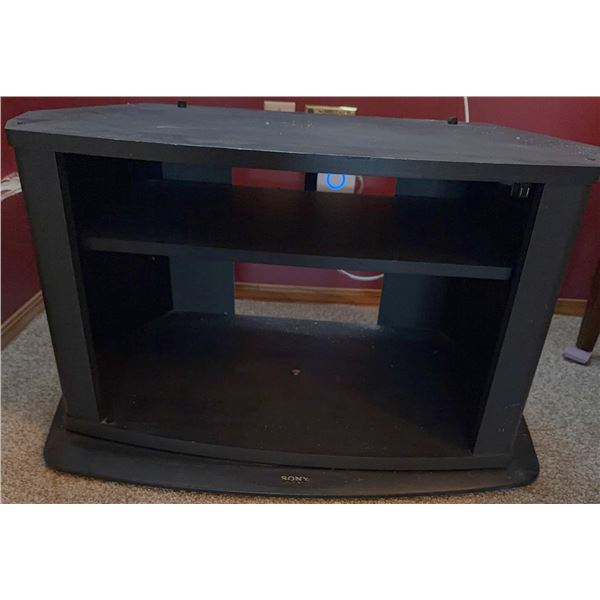Black Wooden TV Stand with Shelf and Curved Sony Base