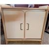 Image 1 : Metal Cabinet With Shelf and Dual Doors, Cream Finish With Gold Accent Trim