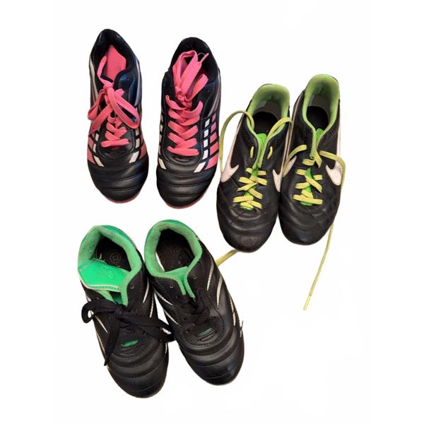 Three Pairs of Kids' Soccer Cleats Assorted Brands Sizes and Colours