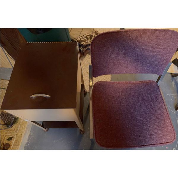 Small Brown Metal Storage Cabinet With Drawer and Two Purple Upholstered Chairs