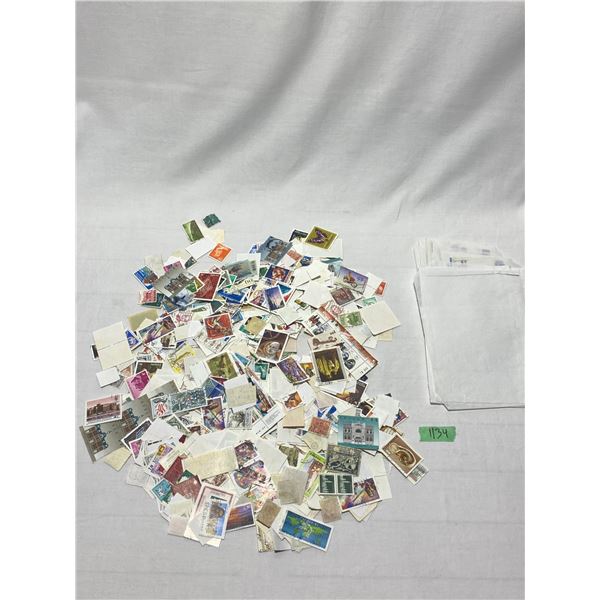 Worldwide Postage Stamp Accumulation with Cookie Tin & Sleeves