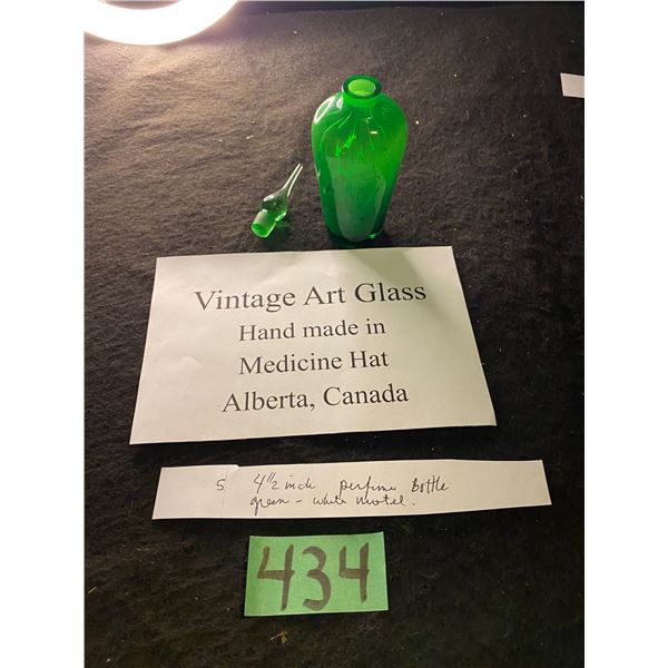 Green perfume bottle with stopper