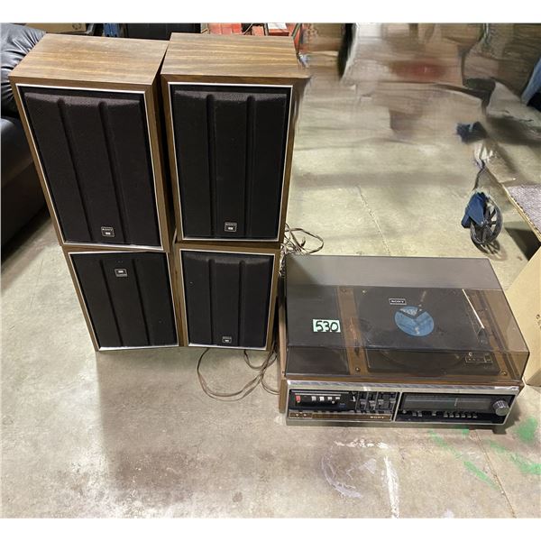 Stereo with record player and 4 speakers