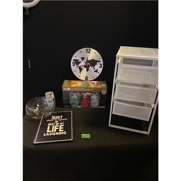 Assorted lot of home items including LED holiday jars, storage drawers and more