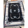 Image 1 : Black and White Floral Pattern Area Rug with Fringes, Measures 86 x 63 Inches