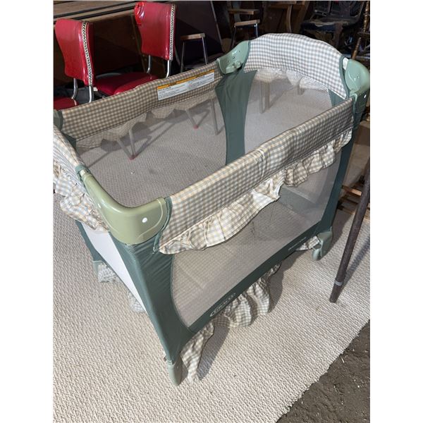 Graco Travel Lite Crib Portable Playard With Plaid Fabric and Mesh Sides