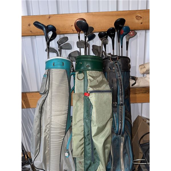 3 Golf Bags with Mixed Golf Clubs and Additional Loose Clubs