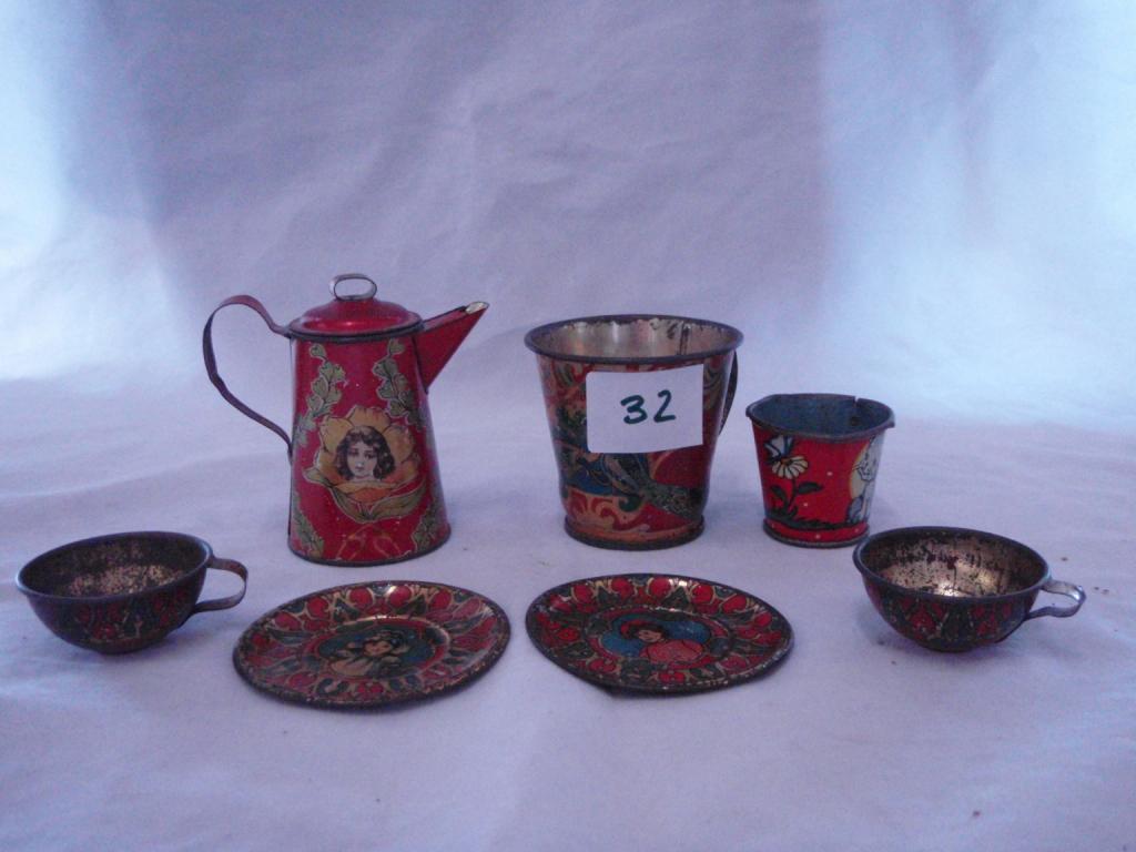 Antique tin child's tea set