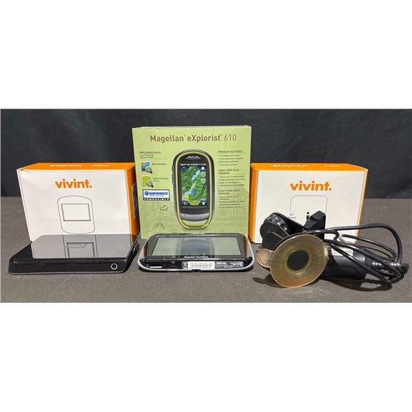 Magellan eXplorist 610 GPS, Roadmate GPS, WD Drive, Vivint Sensors Lot