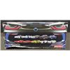 Image 17 : Toys Bundle: Slurpee Tetris, Plush Santa, Train Sets, Car, Sassy Jitter Toy