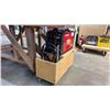 Image 2 : LINCOLN ELECTRIC 140C POWER MIG HEAVY-DUTY 120V WIRE FEEDER WELDER ON SMALL WOODEN MOBILE STORAGE