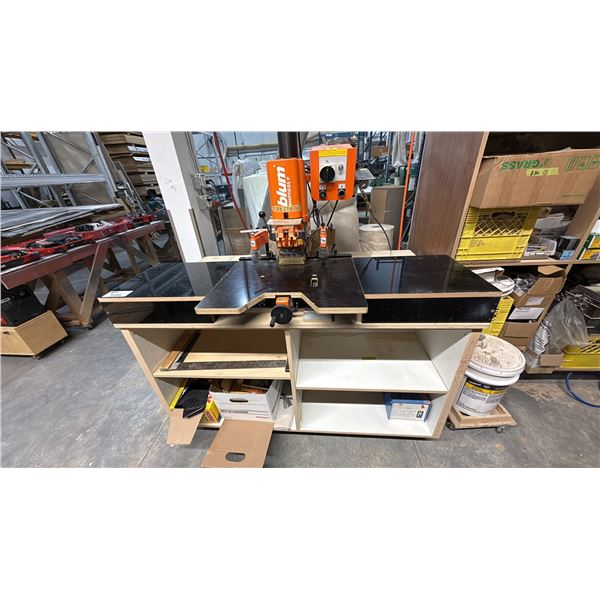 BLUM MINIPRESS P PNEUMATIC FEED DRILLING AND HARDWARE INSERTION MACHINE ON WOODEN SHOP CABINET