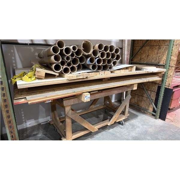 ROLLING WOOD TABLE WITH ASSORTED CONTENTS INCLUDING; WOOD PANELS, 2X4 WOOD PIECES, CARDBOARD