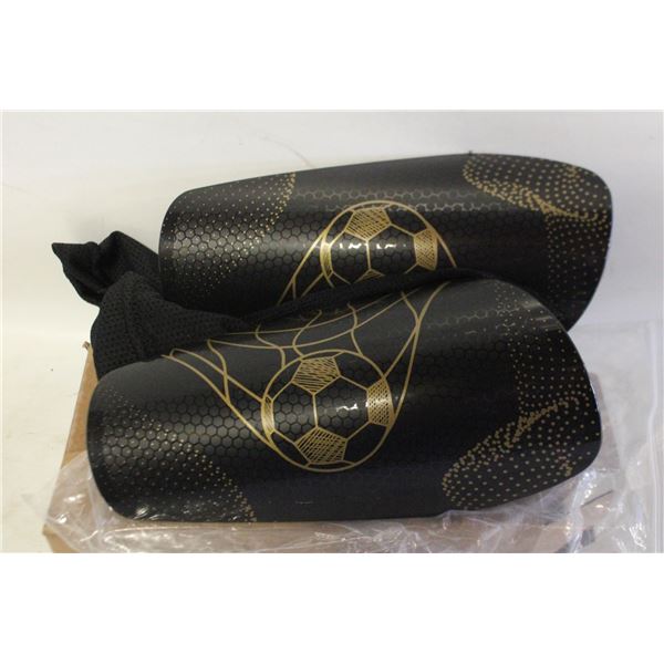 NEW PAIR MEDIUM SHIN GUARDS BLACK & GOLD COLOR