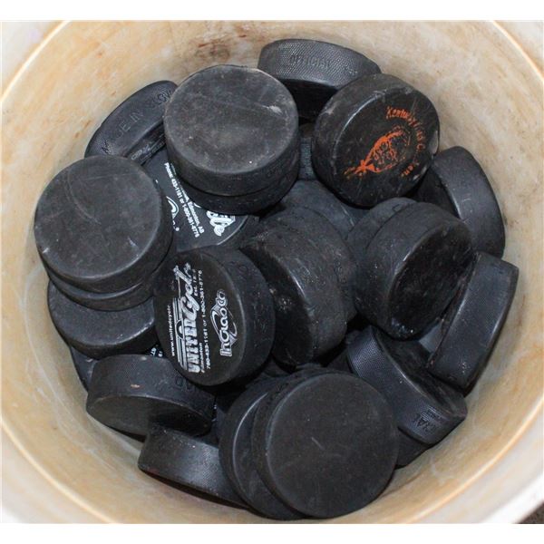 BUCKET W/30+ HOCKEY PUCKS MOST UNUSED