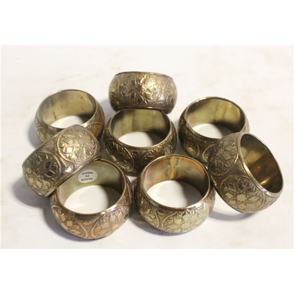 EIGHT BRASS NAPKIN RINGS