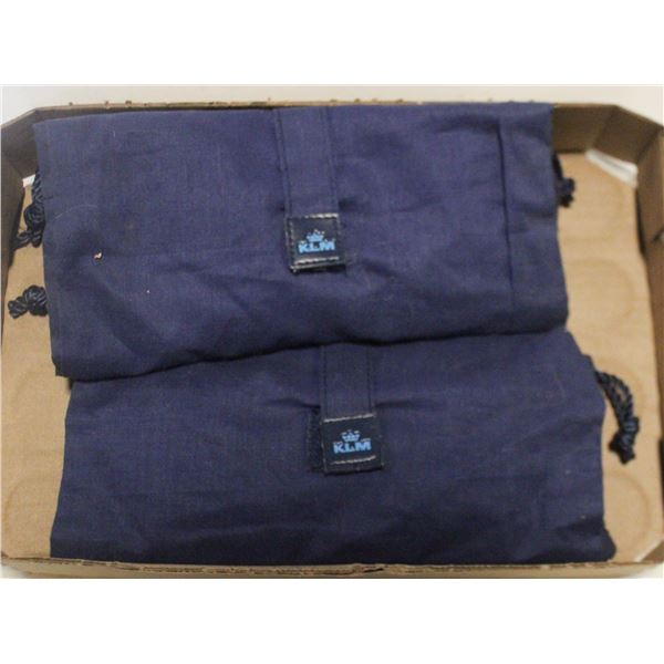 2 COMPLEMENTARY FIRST CLASS BAGS