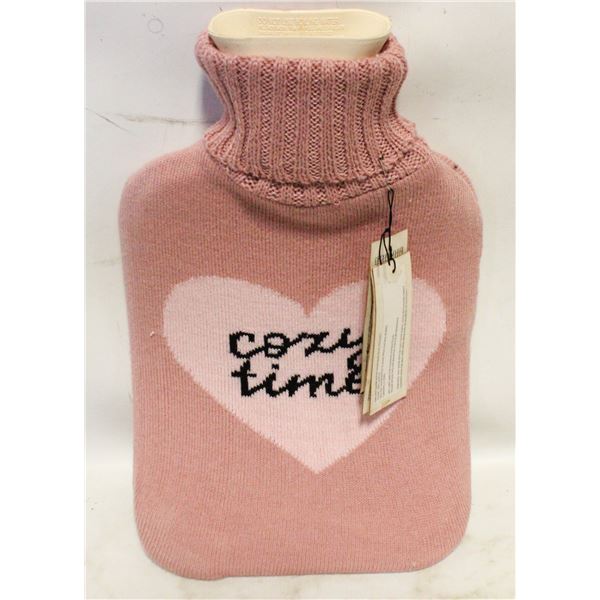 NEVER USED HOT WATER BOTTLE WITH