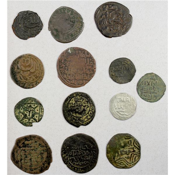 EARLY ISLAMIC: ILKHAN: LOT of 12 copper fulus