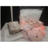 Image 3 : Soft Pink Bedding, Sheets Likely Double or Queen, Plush Dinosaur Wrap Blanket Included