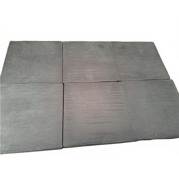 Six Black Foam Floor Cushions