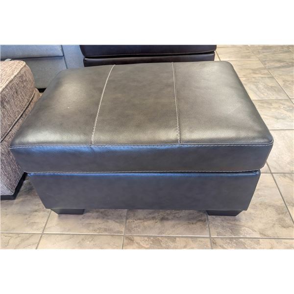 ONSITE: ASHLEY MORELOS GREY LEATHER OTTOMAN