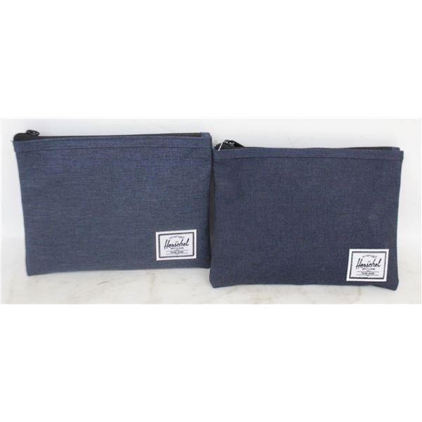 PAIR OF HERSCHELS 1ST CLASS GOODIE BAGS