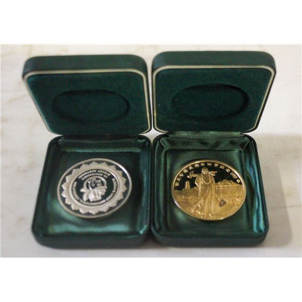 PAIR OF BLIA INTERNATIONAL ASSOCIATION COINS