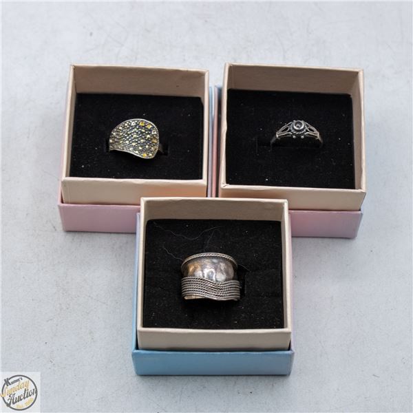 BOX WITH THREE .925 SILVER RINGS - ALL SIZE 6