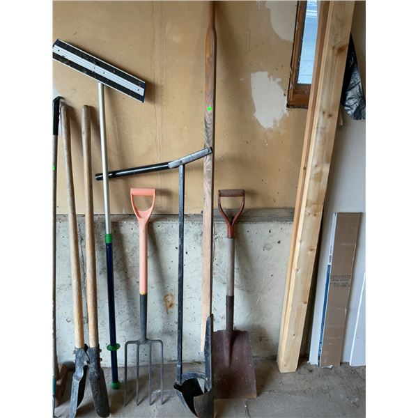 Gardening and Winter Tools with Snow Shovel and Two Post Hole Diggers