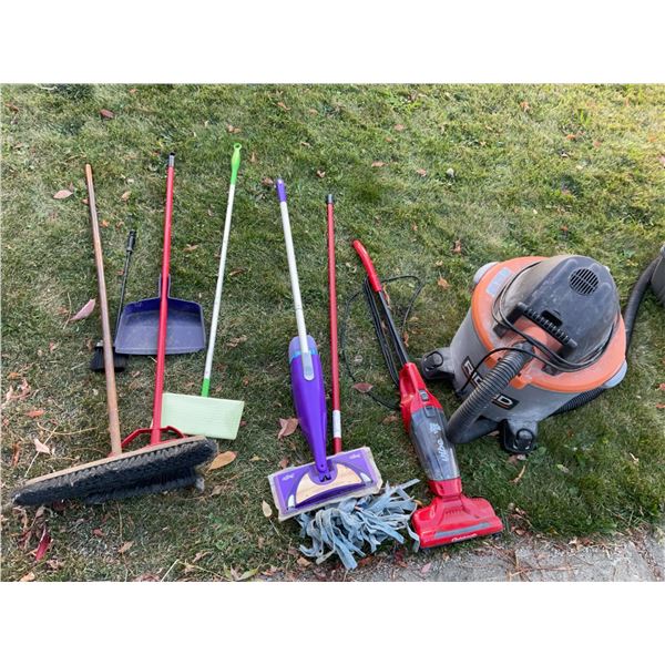 Cleaning Lot With Shop Vac, Dirt Devil, Brooms, Mop, Cat Carrier, and Small Table
