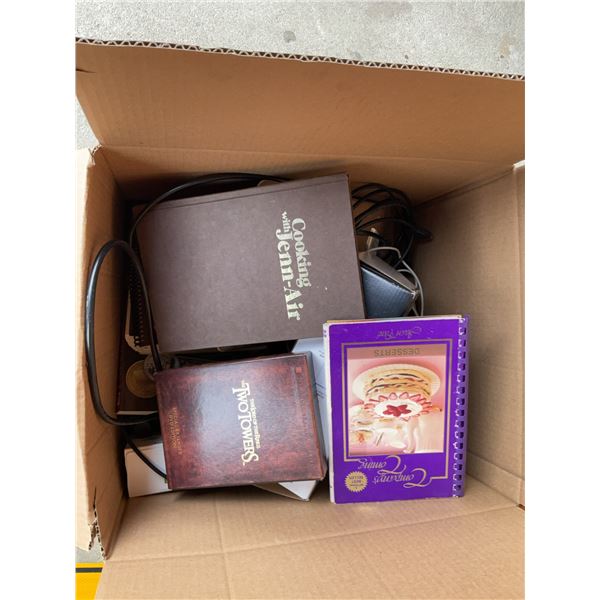 Box with QuickBooks, Cookbooks, Lord of the Rings Two Towers DVD and Surprises