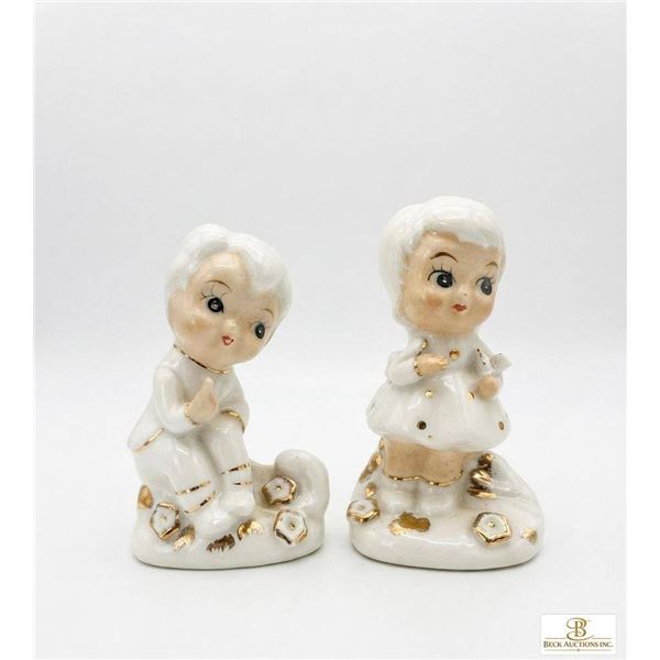 Porcelain Boy and Girl Figurines with Gold Accents