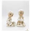 Image 1 : Porcelain Boy and Girl Figurines with Gold Accents