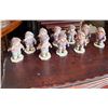 Image 5 : 8 Porcelain Girl Figurines in Winter Clothing