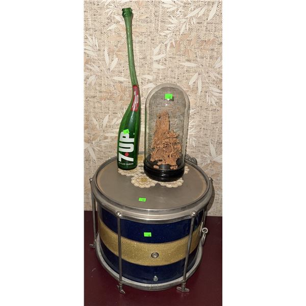 Blue and Gold Snare Drum, 7UP Bottle, and Carved Wood Sculpture Under Glass Dome