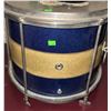 Image 3 : Blue and Gold Snare Drum, 7UP Bottle, and Carved Wood Sculpture Under Glass Dome