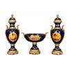 Image 5 : Spanish Sèvres. Three Cobalt Blue Porcelain Vases with Gilded Accents and Painted Scenes