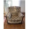 Image 1 : Upholstered Armchair With Carved Wood Detail